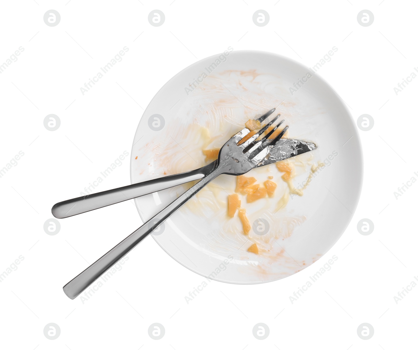 Photo of Dirty plate and cutlery on white background, top view