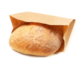 Photo of Paper bag with bread on white background