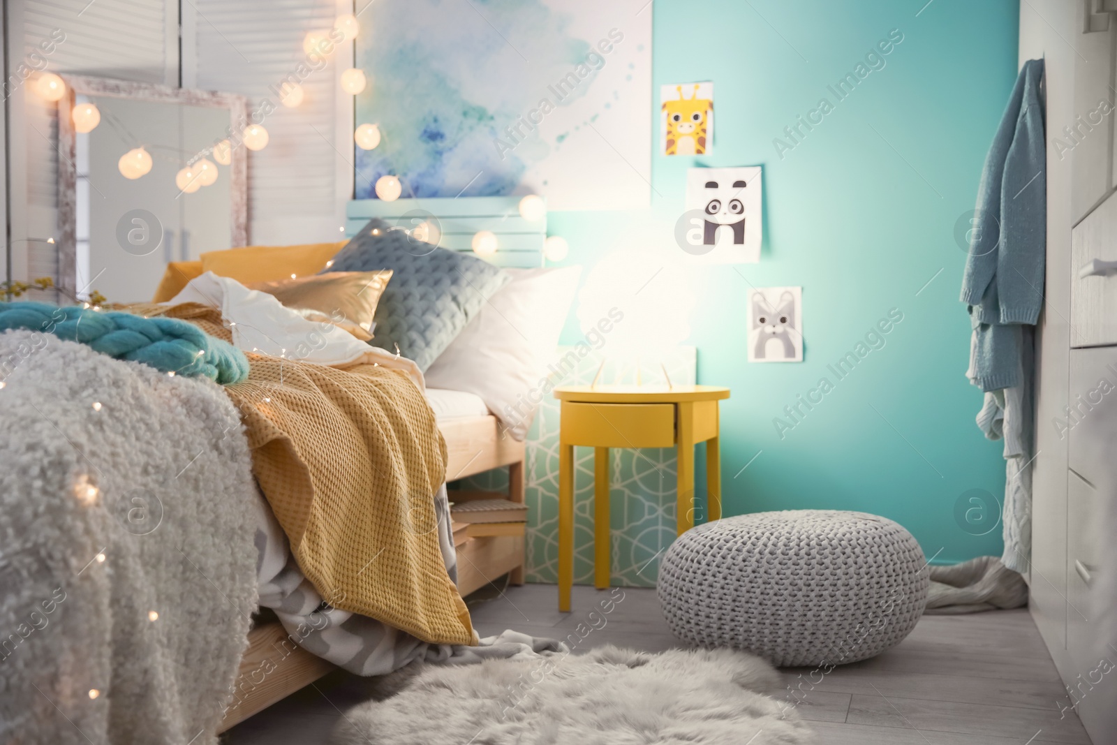 Photo of Cozy room interior with comfortable bed