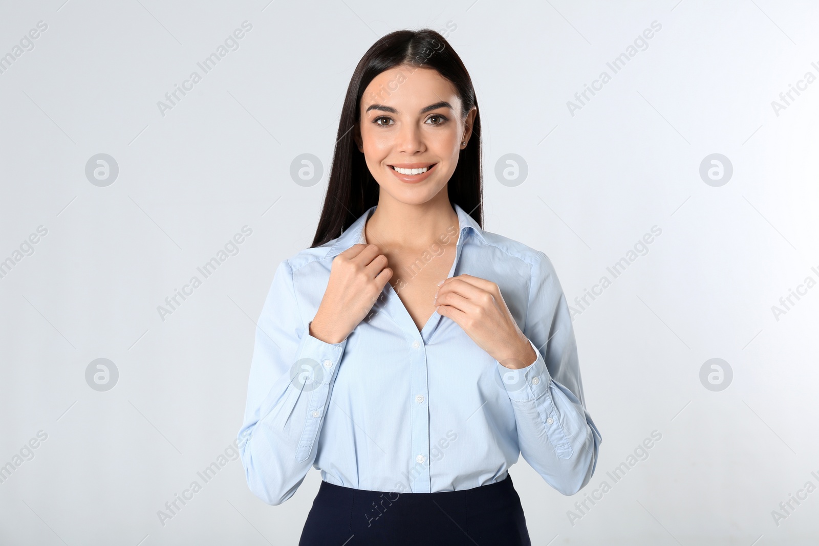 Photo of Portrait of young businesswoman on white background