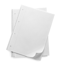 Photo of Stack of checkered paper sheets on white background, top view