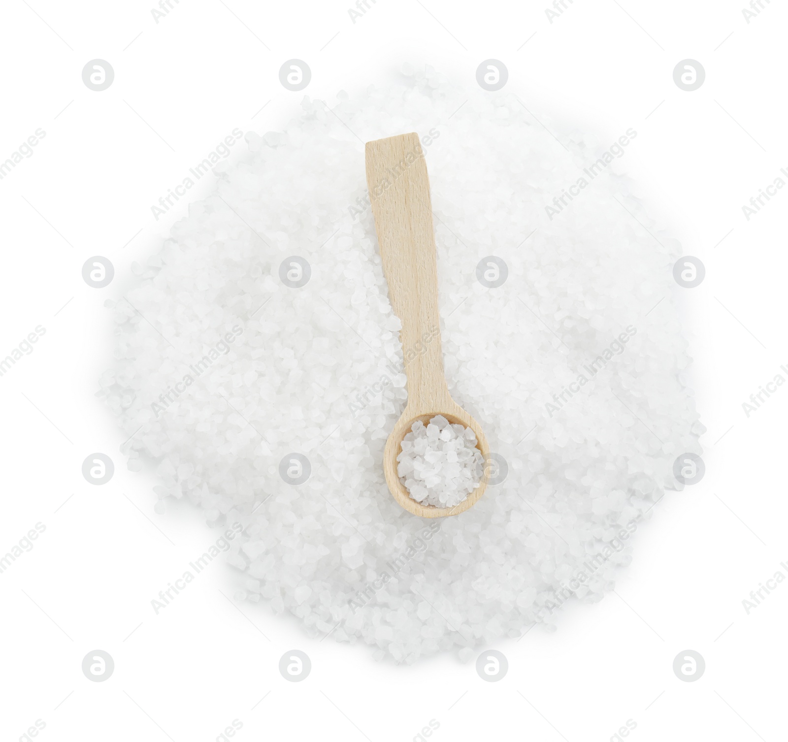 Photo of Heap of natural salt and wooden spoon isolated on white, top view