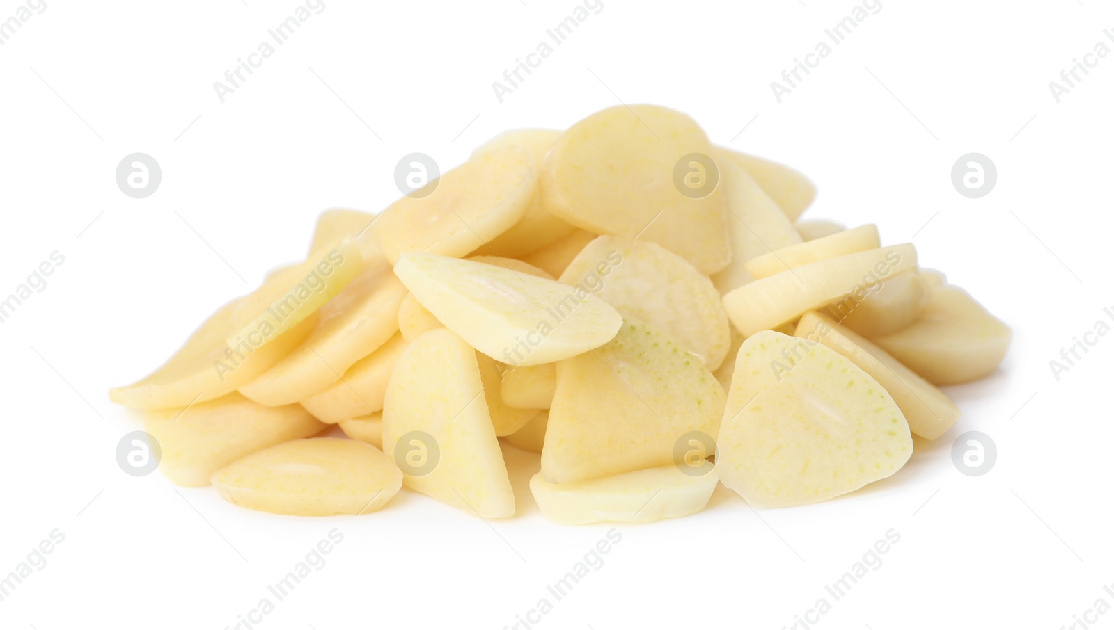 Photo of Pile of fresh sliced garlic cloves isolated on white. Organic food