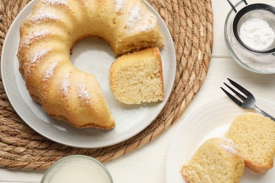 Photo of Delicious sponge cake served on table, flat lay