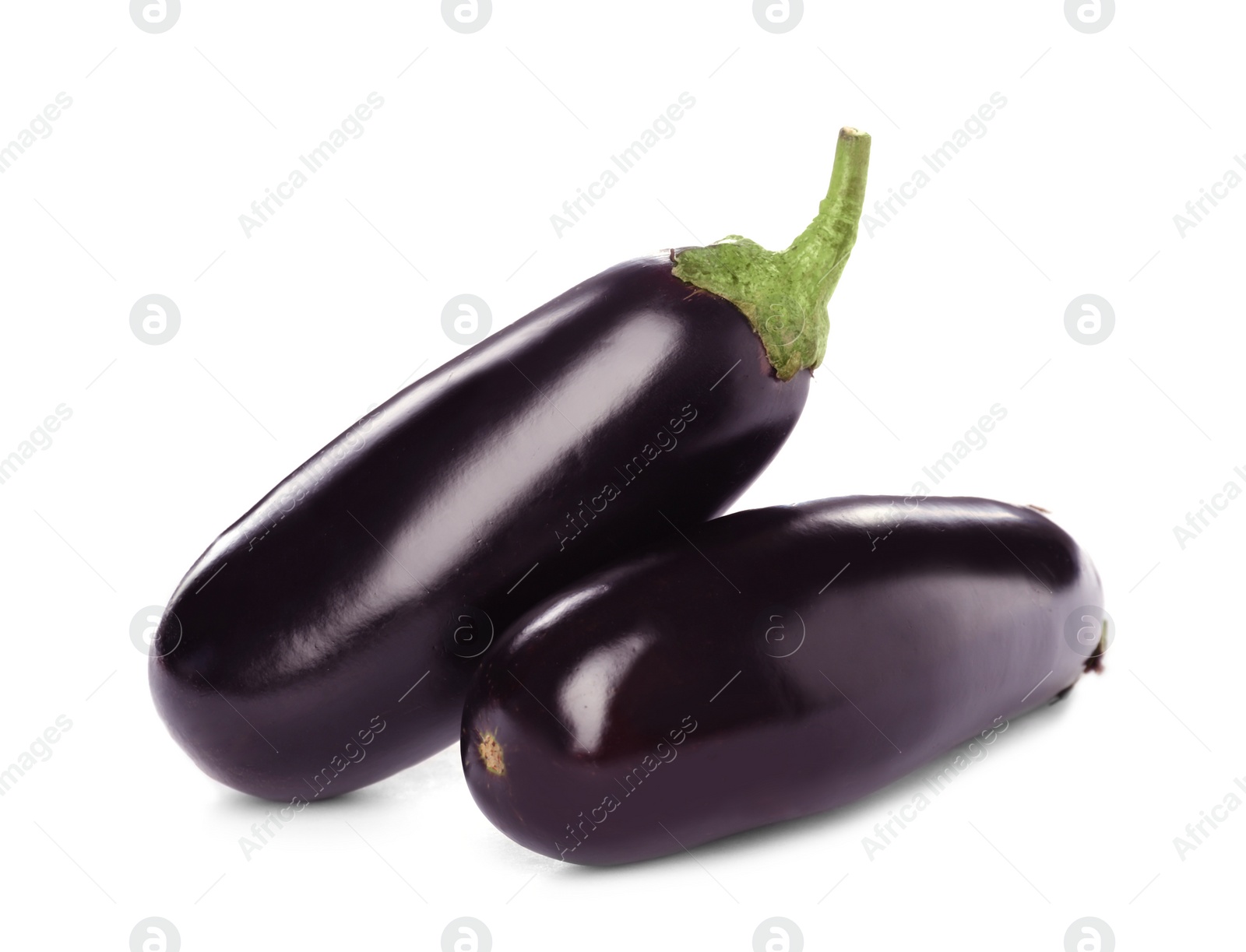 Photo of Tasty raw ripe eggplants on white background