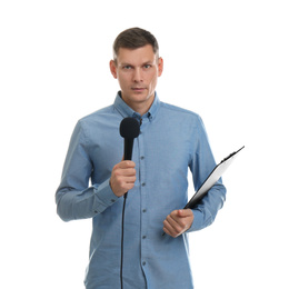 Male journalist with microphone and clipboard on white background