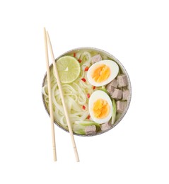 Photo of Bowl of delicious rice noodle soup with meat and egg isolated on white, top view