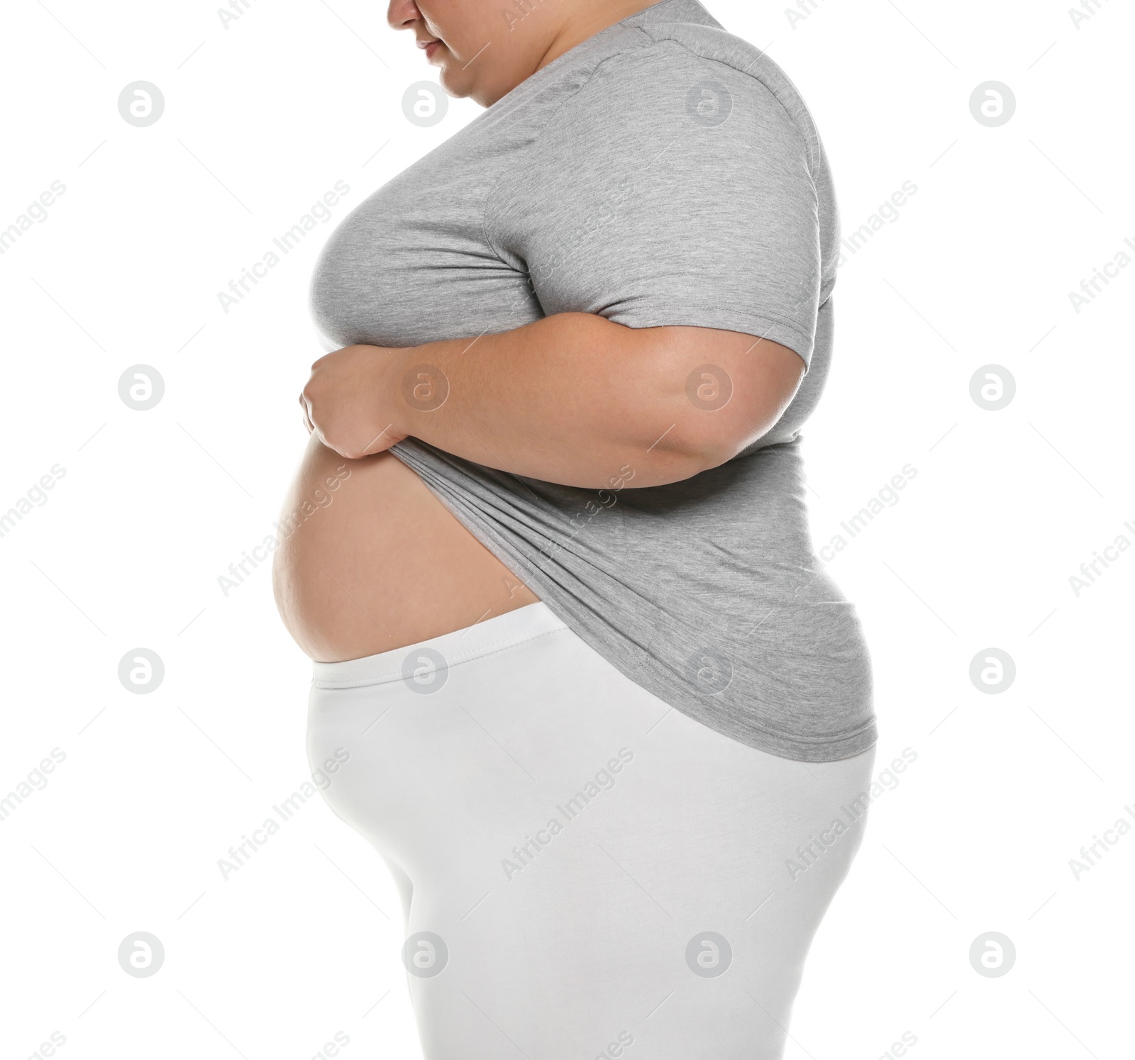 Photo of Overweight woman posing on white background, closeup