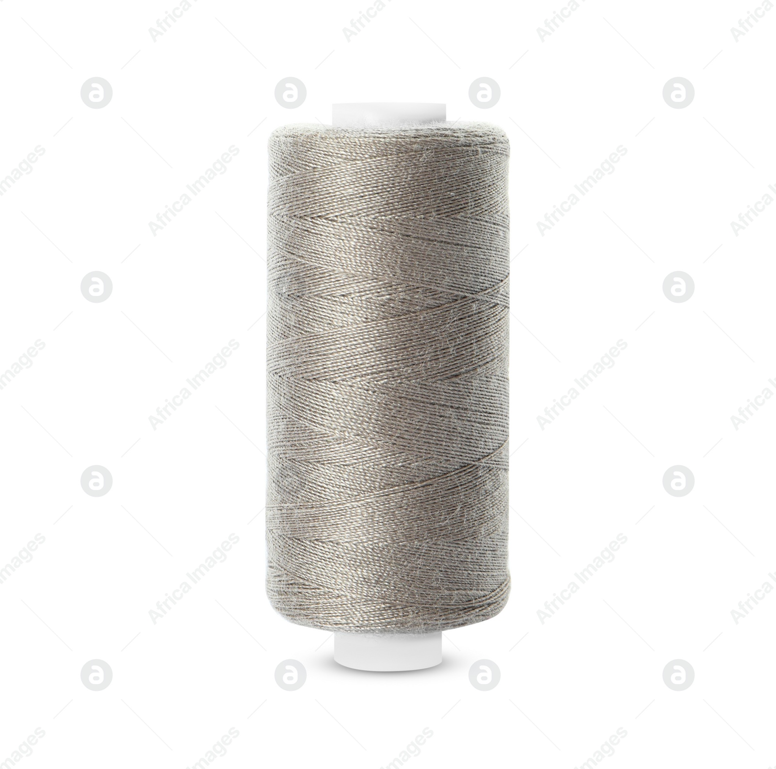 Photo of Spool of light grey sewing thread isolated on white