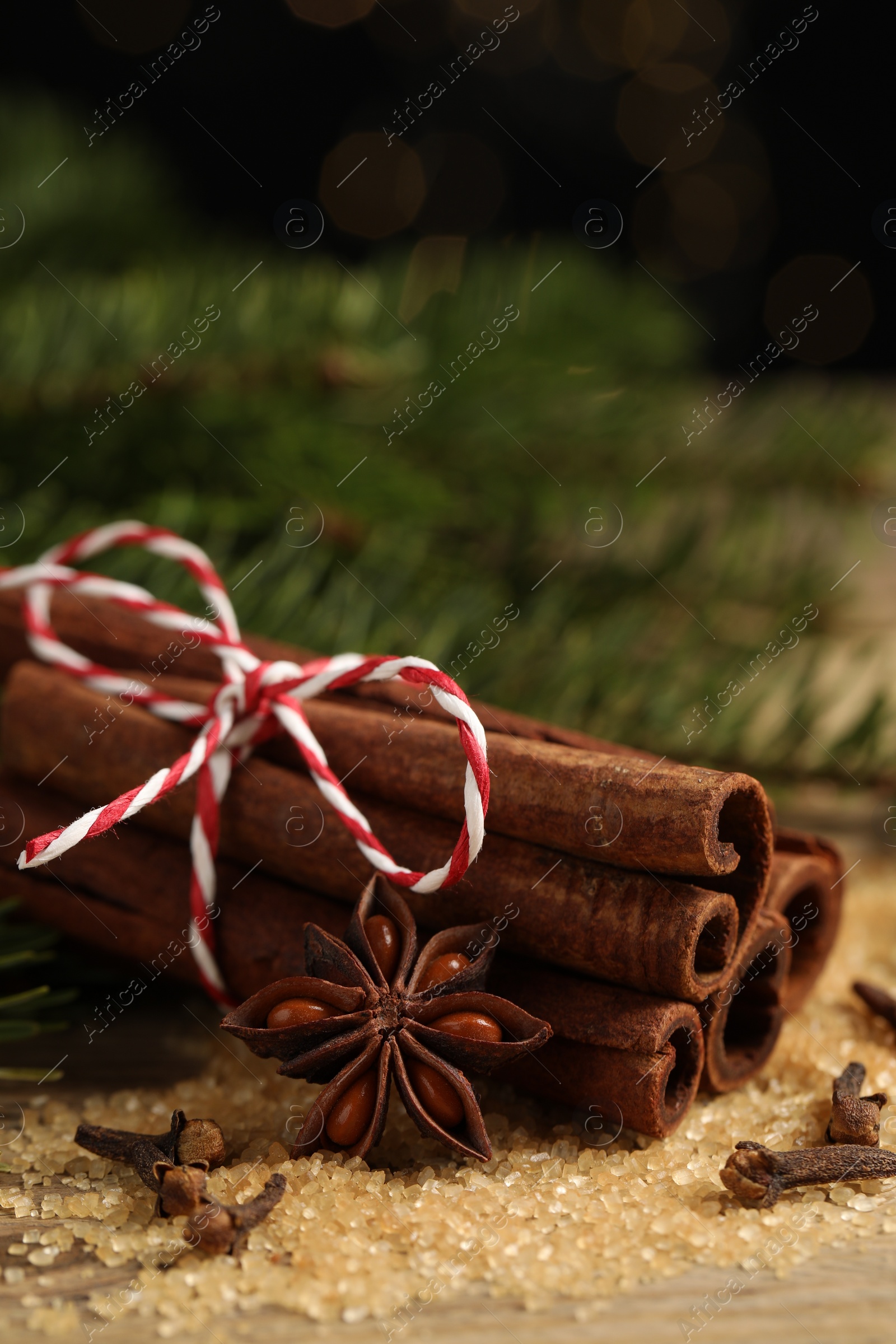 Photo of Different aromatic spices on table, closeup view