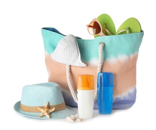 Photo of Composition with bag and beach accessories on white background