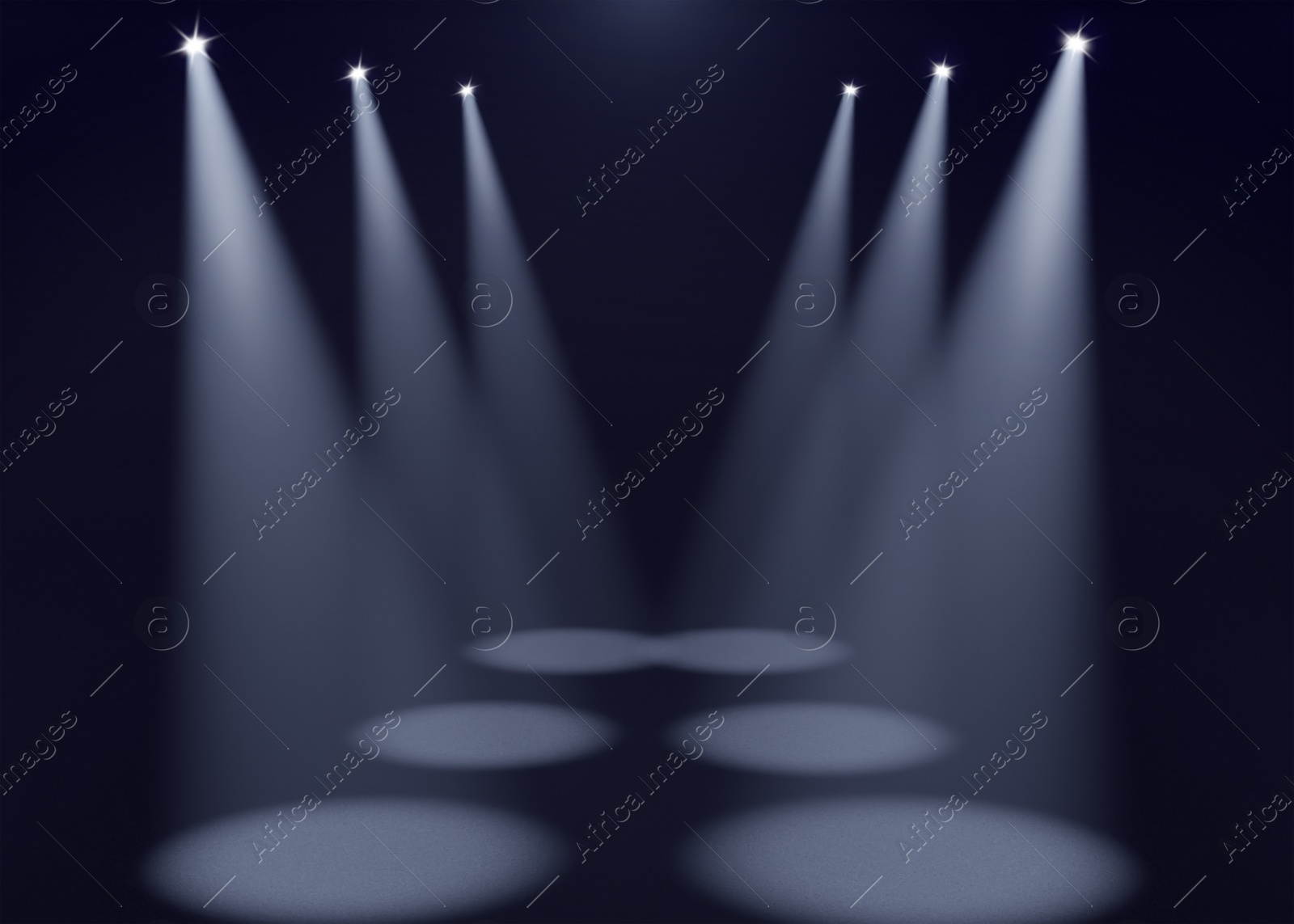 Image of Bright spotlights in dark room. Performance equipment