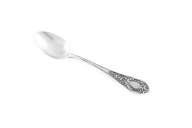 Photo of Clean shiny metal spoon isolated on white