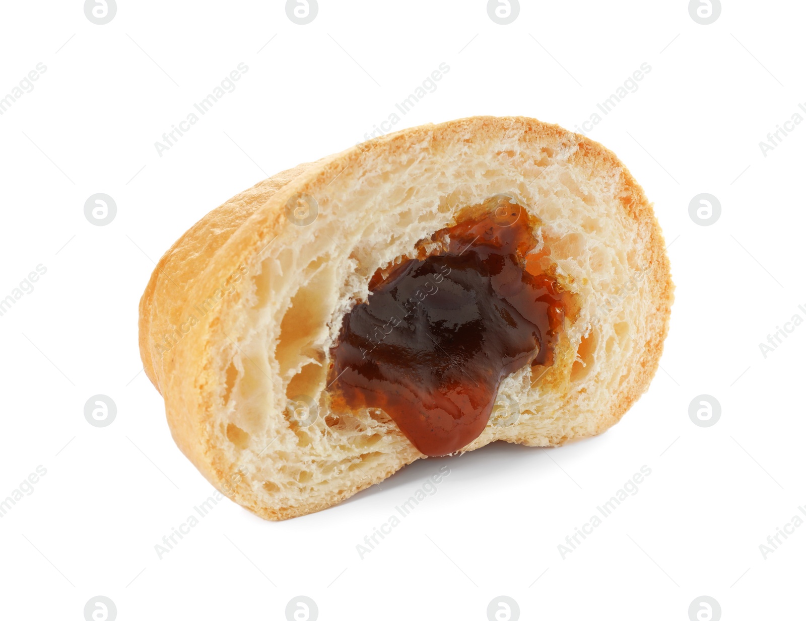 Photo of Delicious cut croissant with jam isolated on white