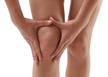 Woman showing her slim legs on white background, closeup