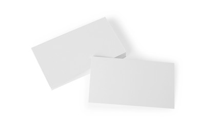 Blank business cards on white background, above view. Mockup for design