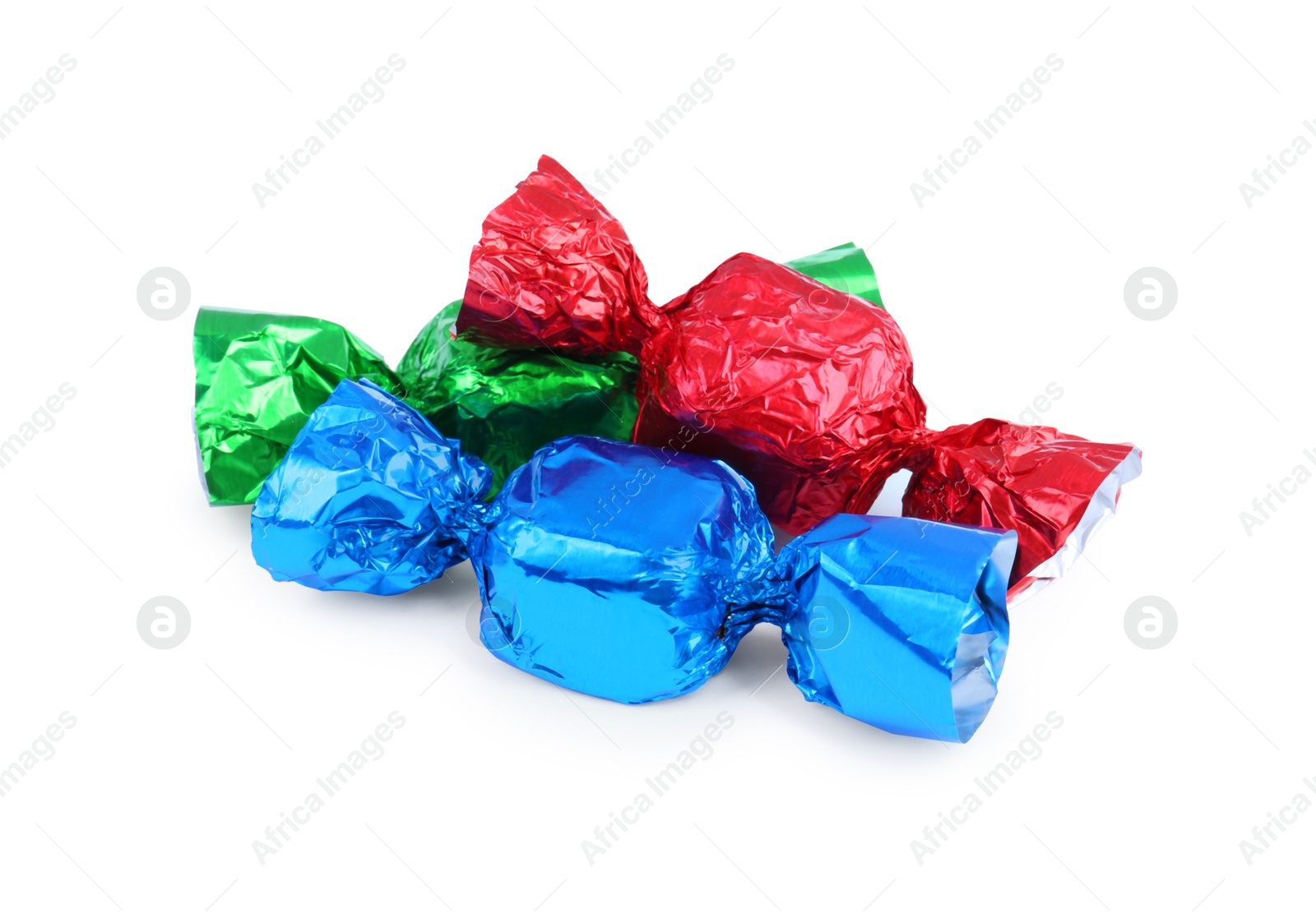 Photo of Tasty candies in colorful wrappers isolated on white