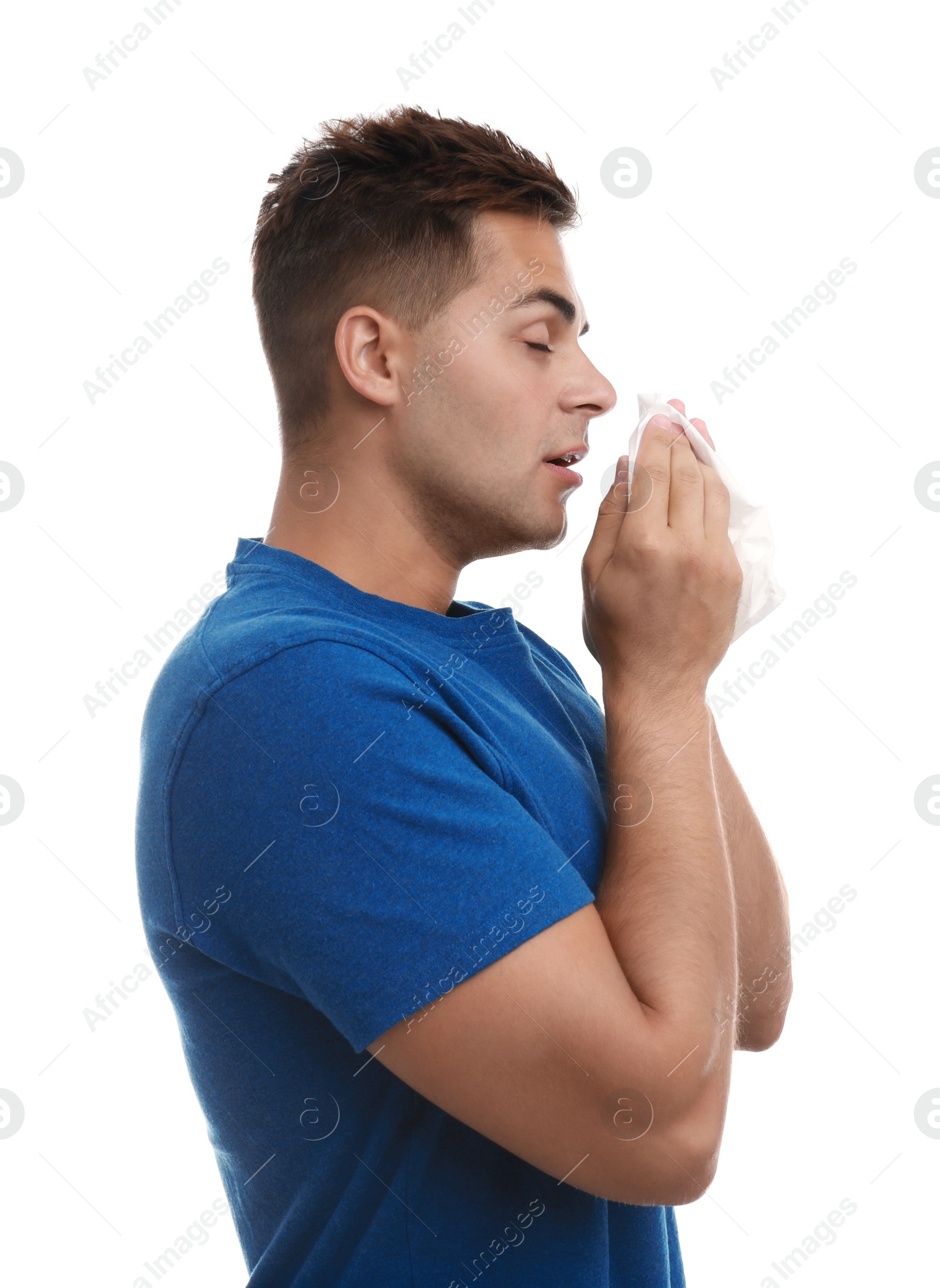 Photo of Young man suffering from allergy on white background