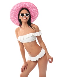 Photo of Beautiful young woman in stylish bikini with hat on white background