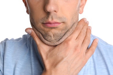 Young man with double chin on white background, closeup