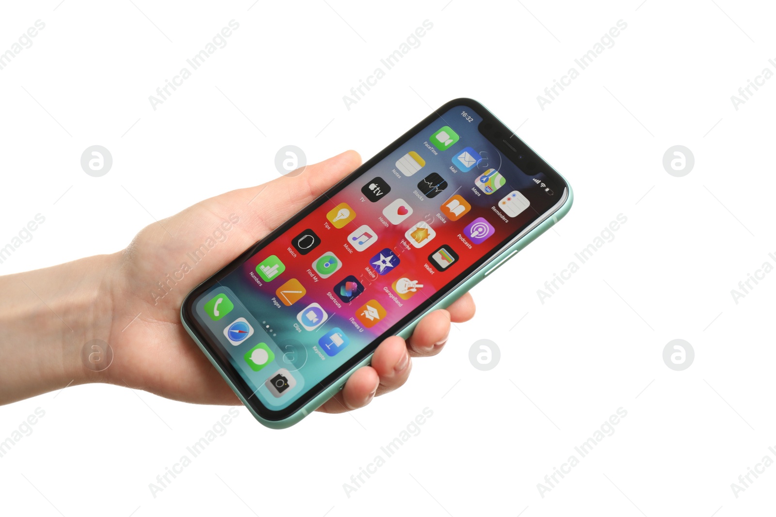 Photo of MYKOLAIV, UKRAINE - JULY 9, 2020: Woman holding  iPhone X with home screen on white background, closeup