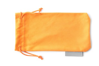 Photo of Orange cloth sunglasses bag isolated on white, top view