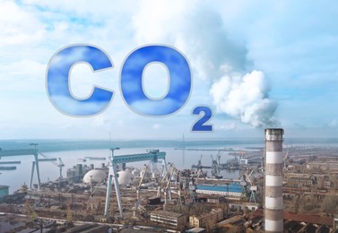 CO2 emissions. Polluting air with smoke, aerial view of industrial factory 