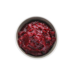 Delicious beetroot puree in bowl isolated on white, top view. Healthy food