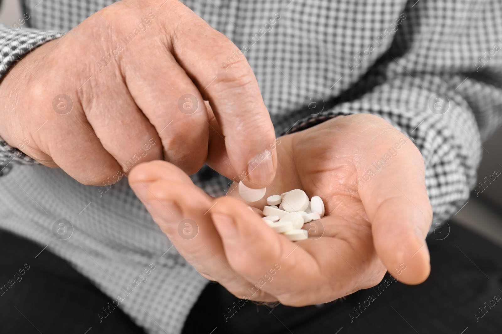 Photo of Senior man taking medicine, closeup. Health care