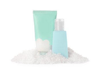 Set of cosmetic products with hand cream and Christmas decor isolated on white. Winter skin care