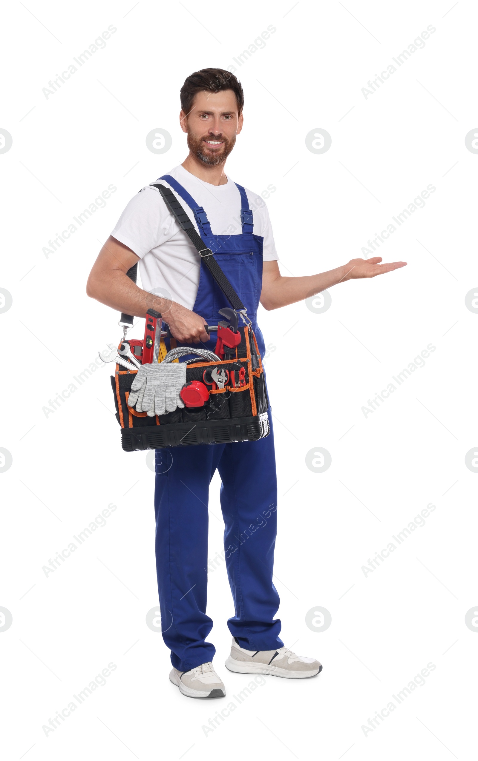 Photo of Professional plumber with tool bag on white background