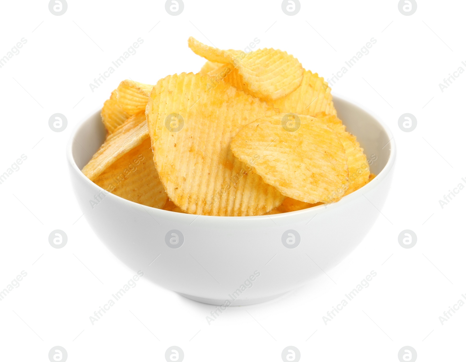Photo of Bowl of tasty ridged potato chips on white background
