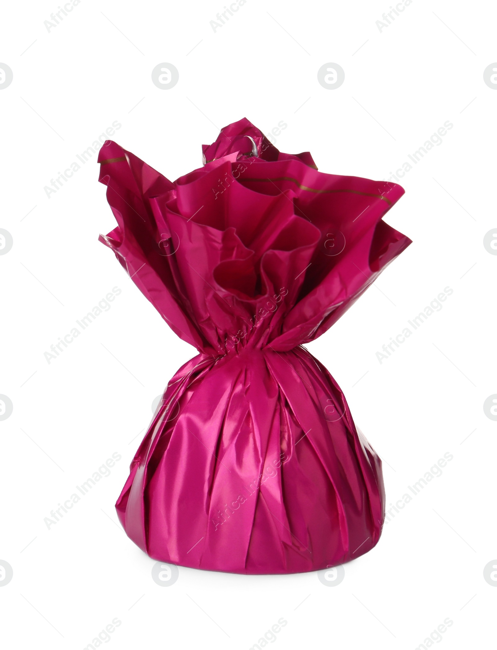 Photo of Delicious candy in pink wrapper isolated on white