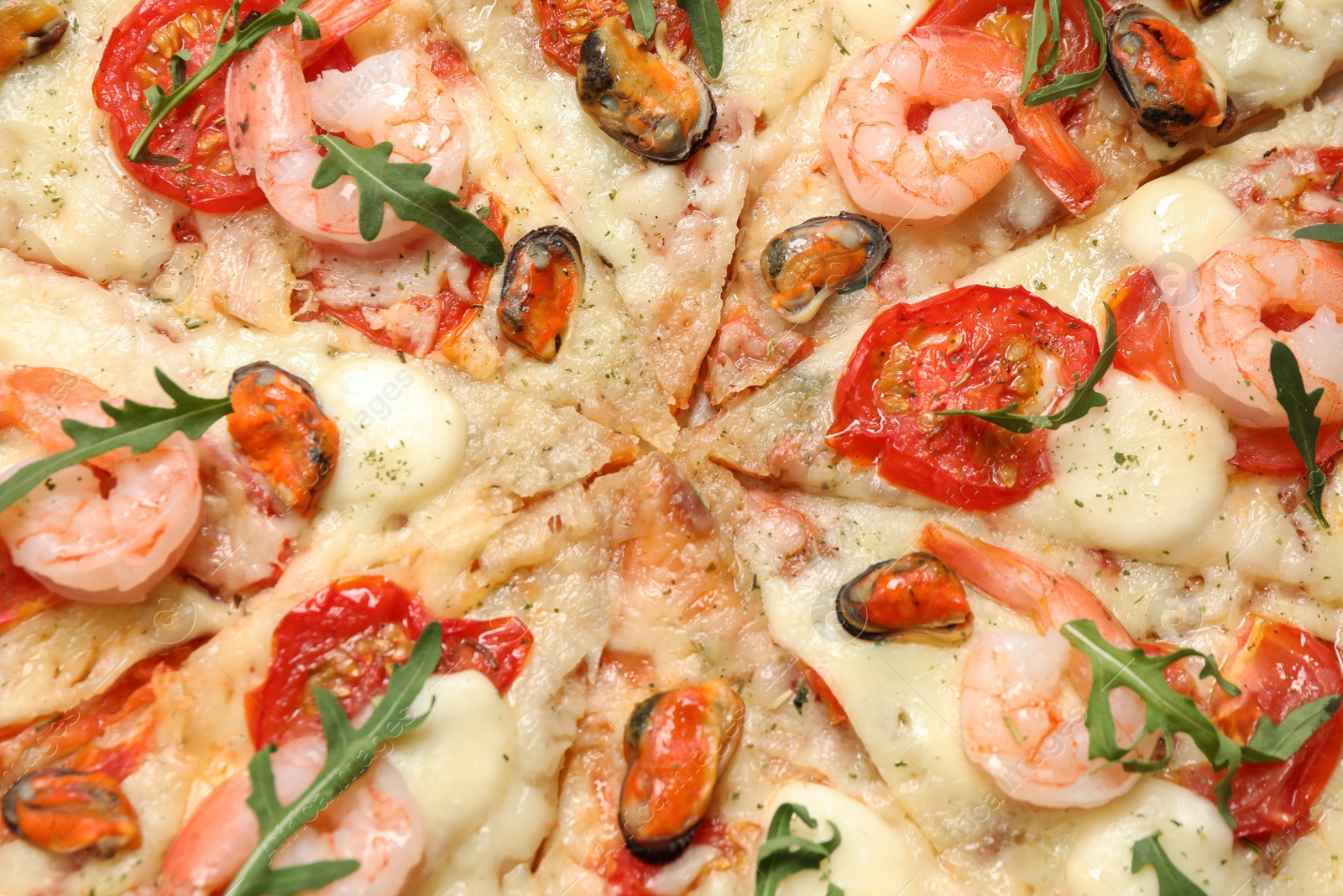 Photo of Delicious seafood pizza as background, closeup view