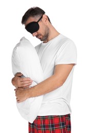 Photo of Man with pillow and eye mask in sleepwalking state on white background