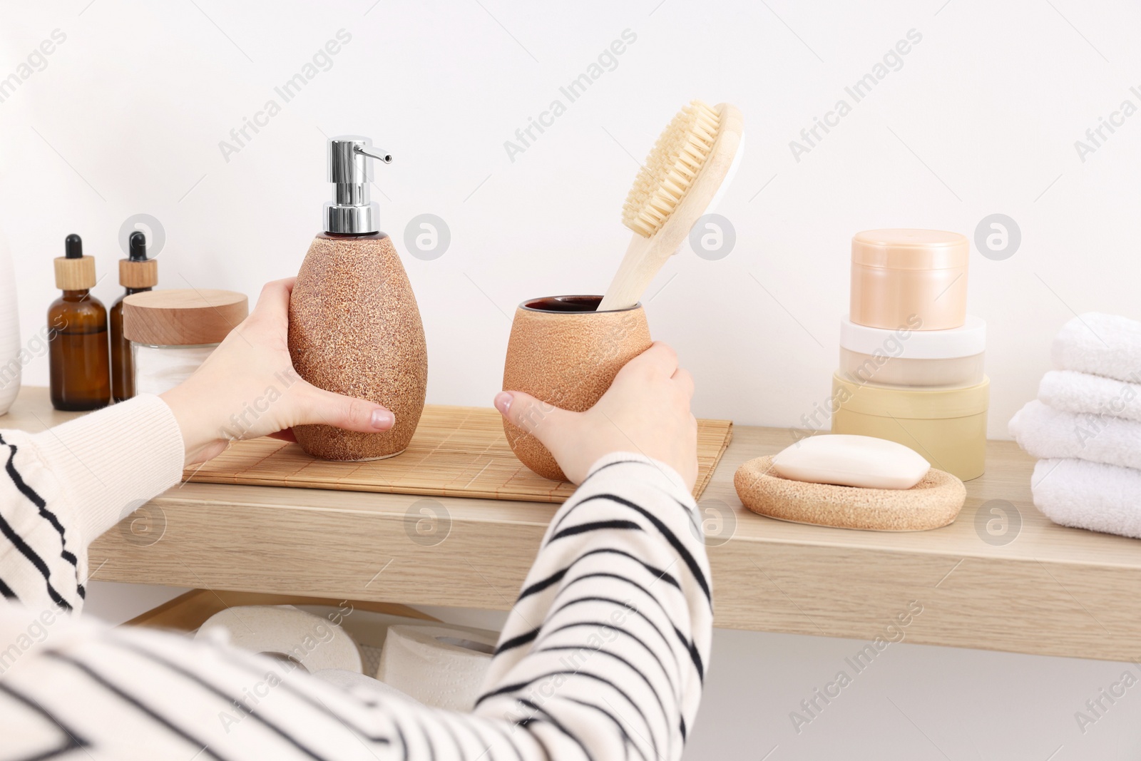 Photo of Bath accessories. Woman with different personal care products indoors, closeup