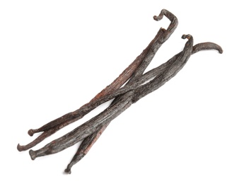 Dried aromatic vanilla sticks on white background