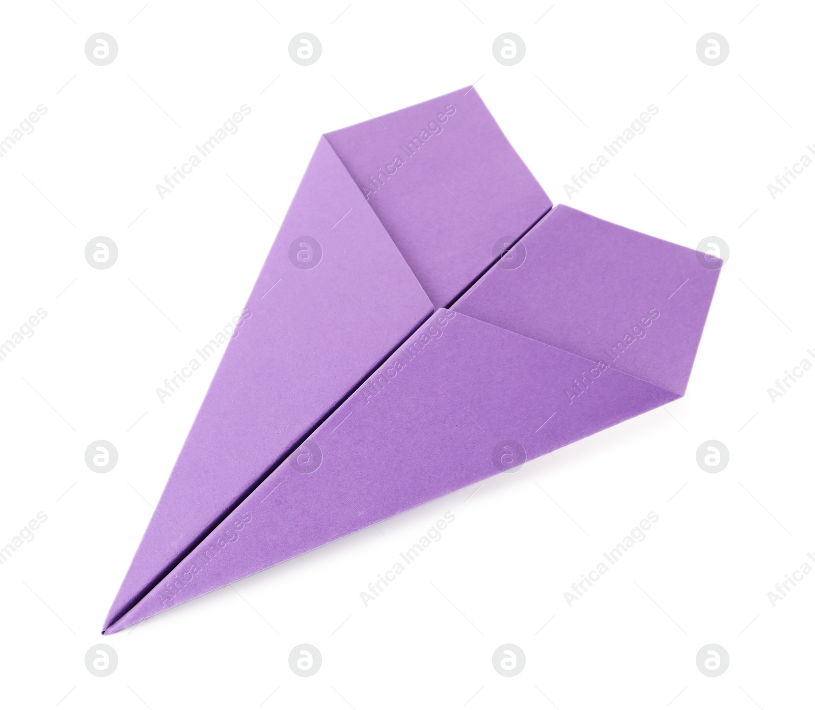 Photo of Handmade purple paper plane isolated on white