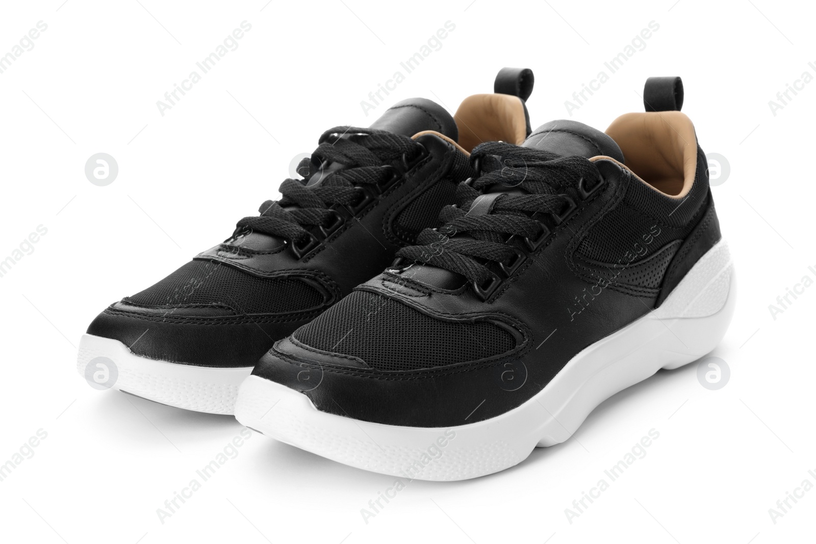 Photo of Pair of stylish shoes on white background