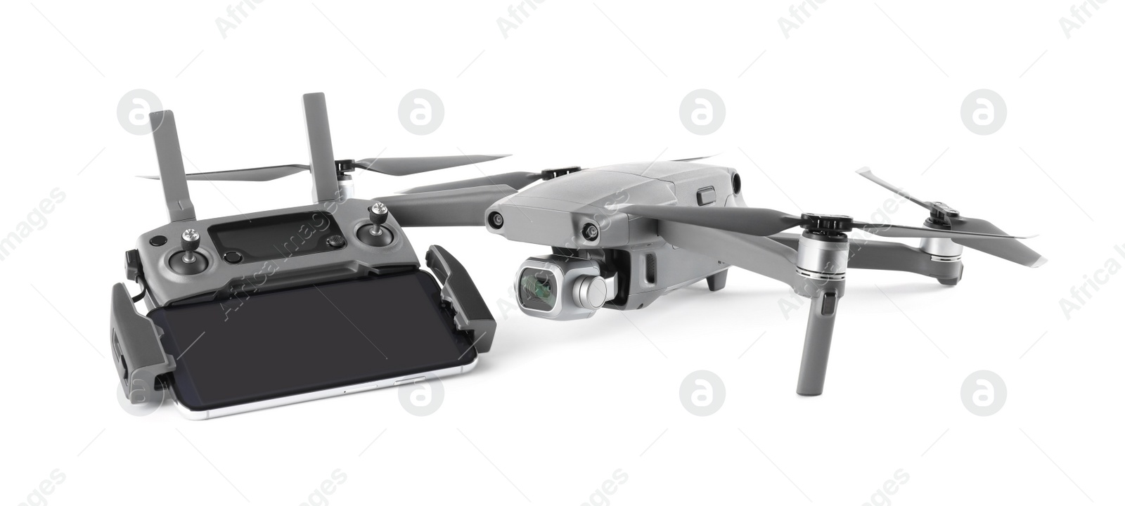 Photo of Modern drone and controller with smartphone  isolated on white