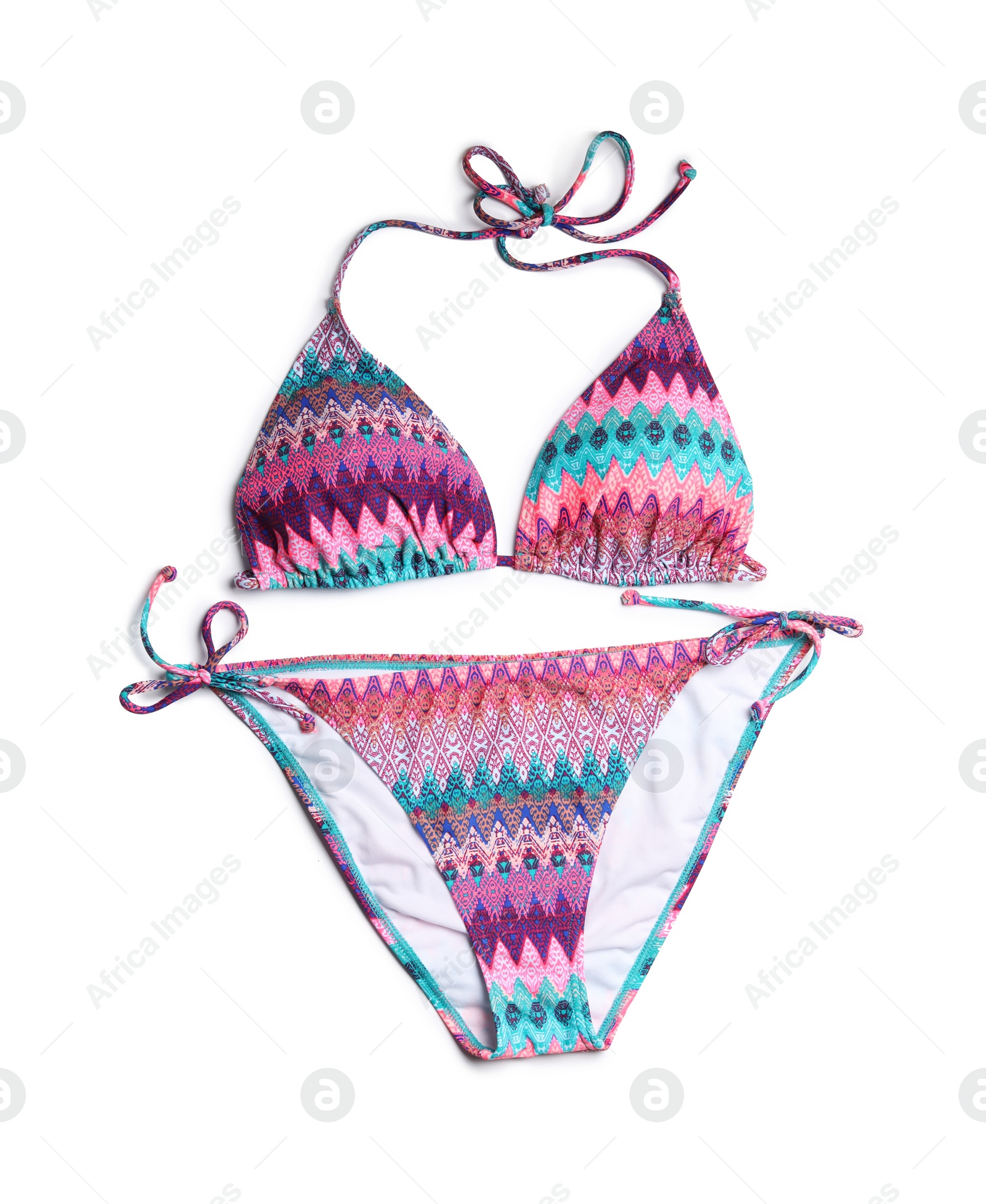 Photo of Stylish bikini on white background, top view. Beach accessories