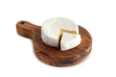 Photo of Wooden board with brie cheese on white background