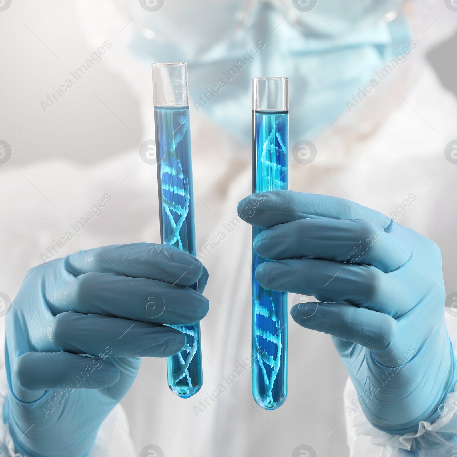 Image of Genetics research. Scientist holding test tubes with liquid and illustrations of DNA structure, closeup