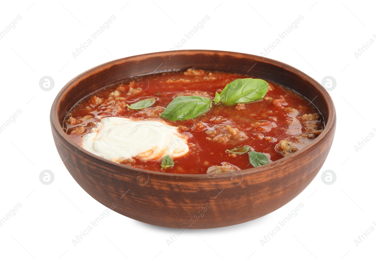 Photo of Bowl of delicious stuffed pepper soup on white background