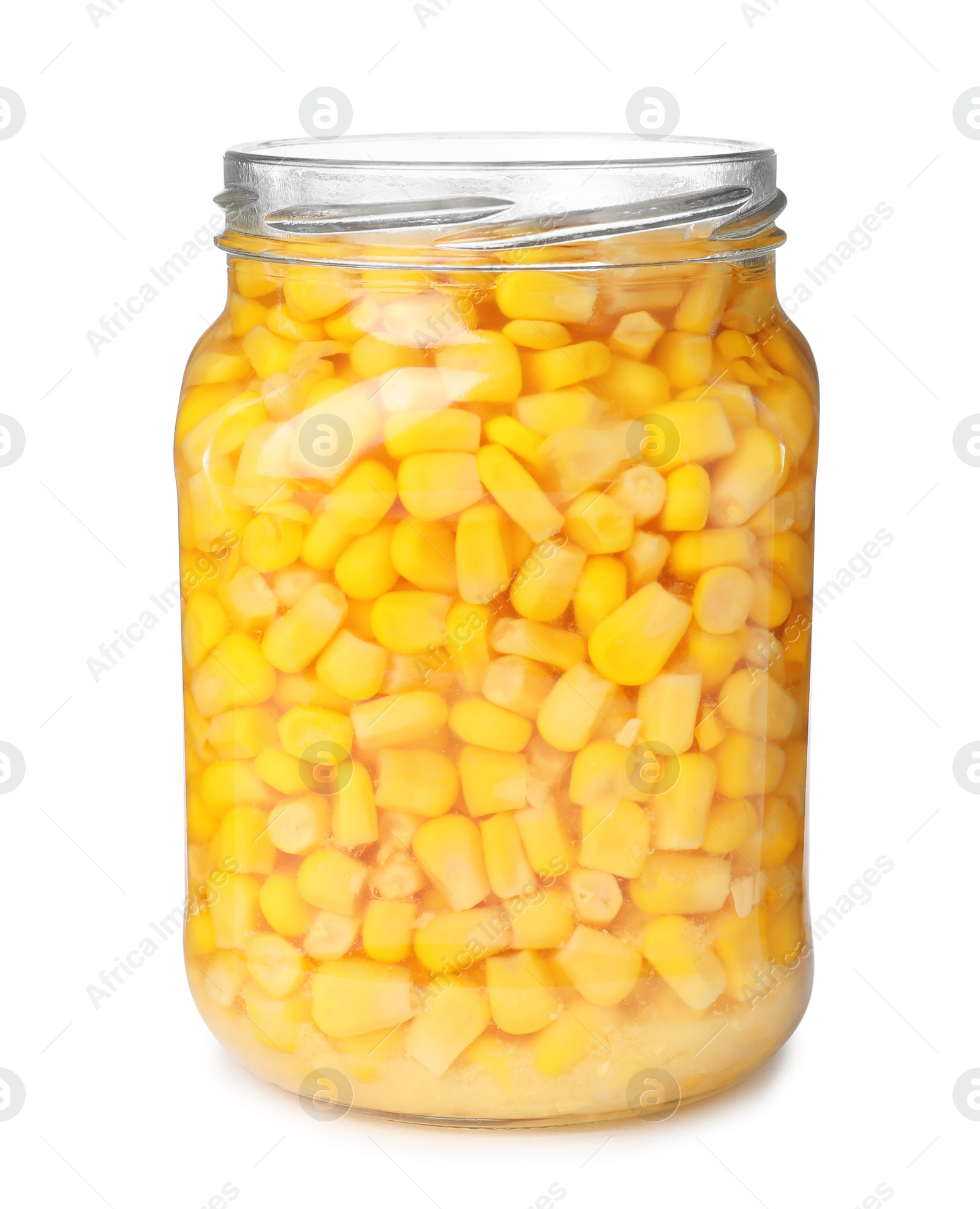 Photo of Glass jar with pickled corn isolated on white