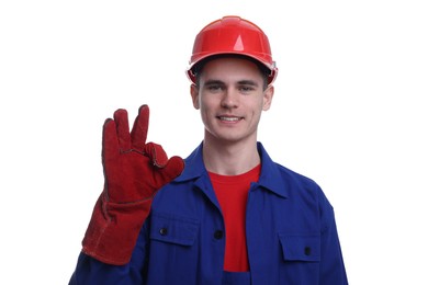 Photo of Young man wearing safety equipment and showing ok gesture on white background