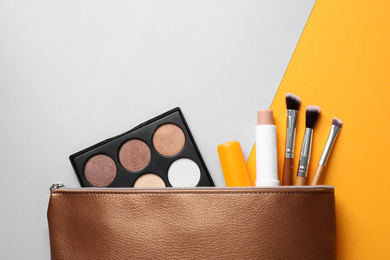 Photo of Flat lay composition with hygienic lipsticks on color background