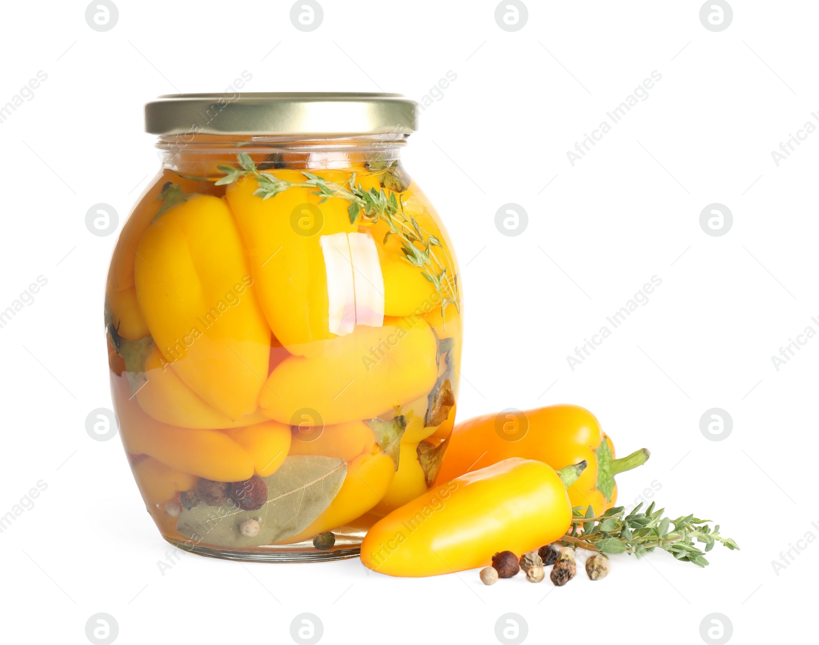 Photo of Glass jar with pickled peppers isolated on white