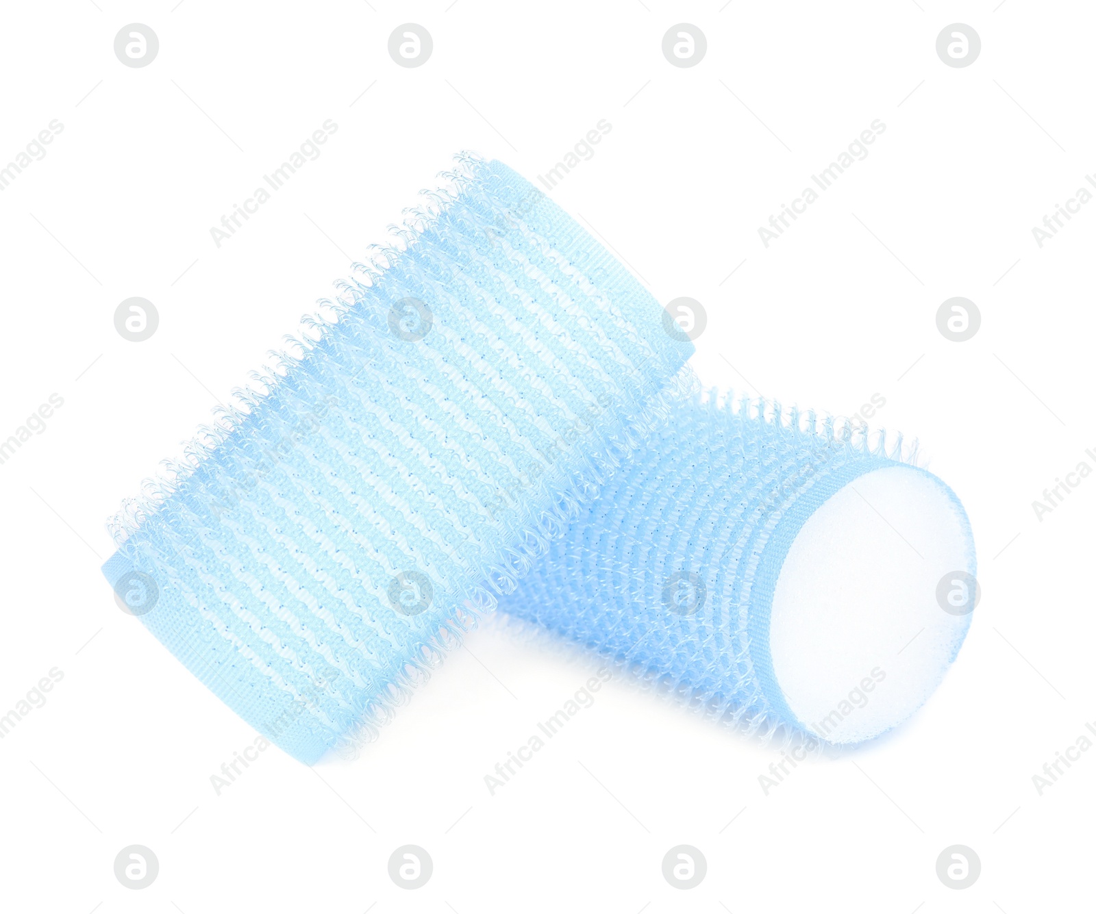 Photo of Hair curlers isolated on white. Styling tool