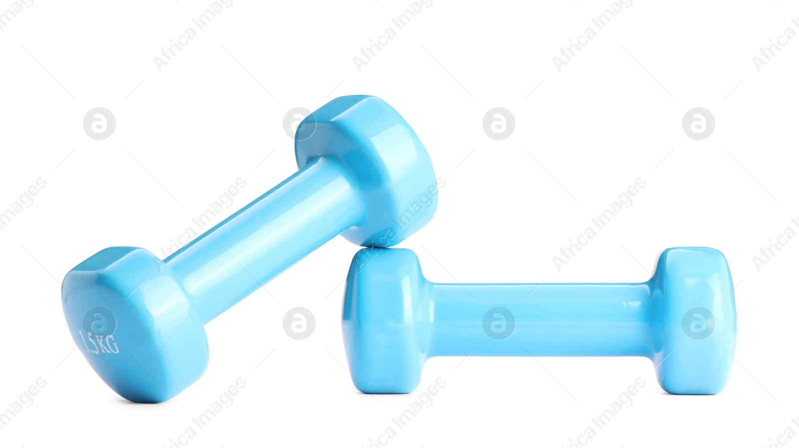 Photo of Light blue dumbbells isolated on white. Sports equipment